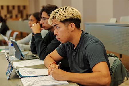 Students in lecture hall being taught