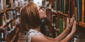 UB student in the library